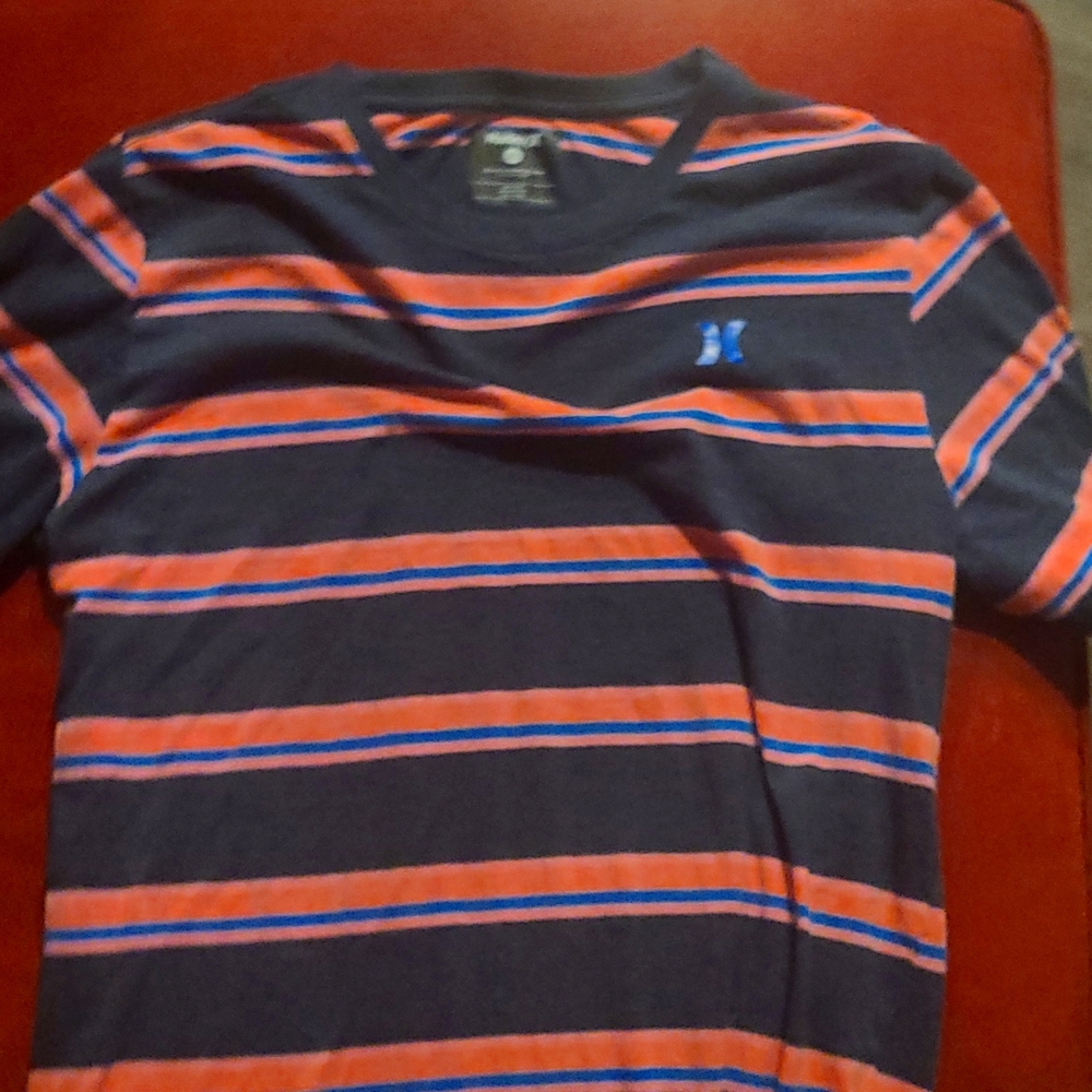 Hurley youth extra large orange stripped shirt.